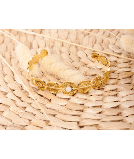 bracelet doré forme ronde pierre blanche