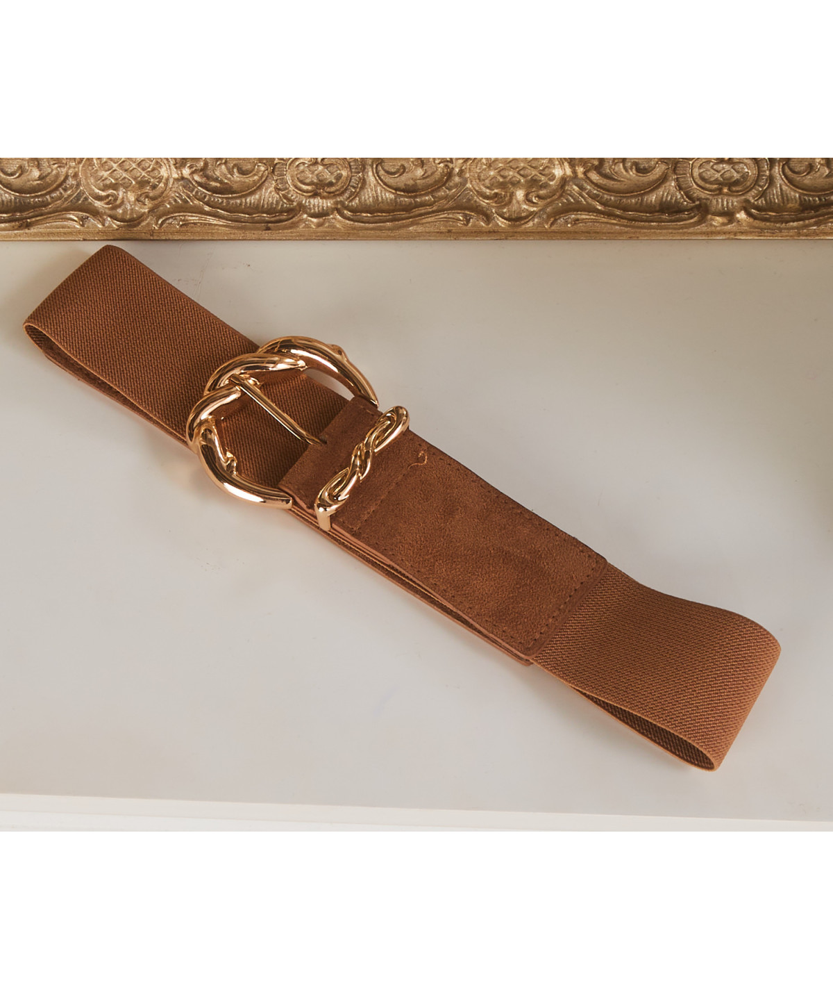 camel belt with gold buckle