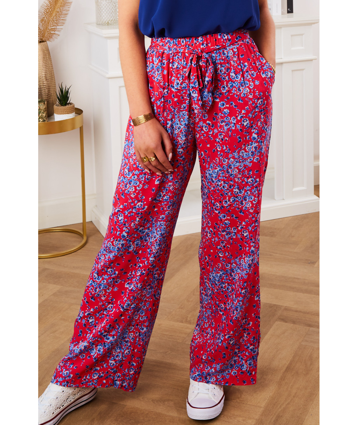 flowing red trousers with blue belt pattern